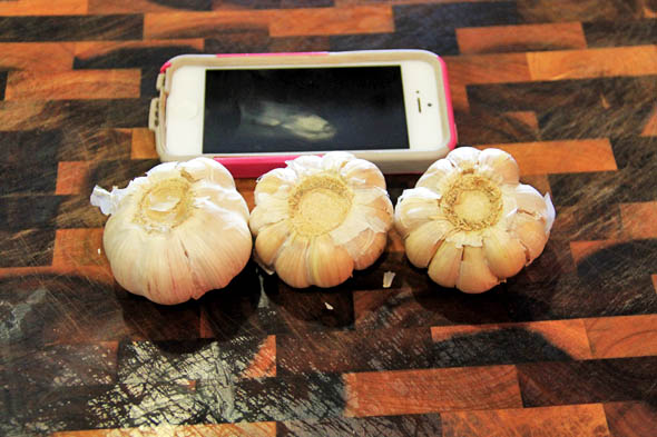 3 heads of garlic. Mine are pretty small, I couldn't find any larger than this. Womp. I put them by my phone so you could compare their size lol.