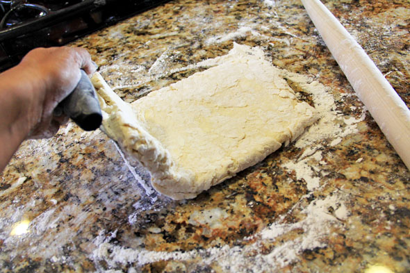 Then, fold half of the dough over.
