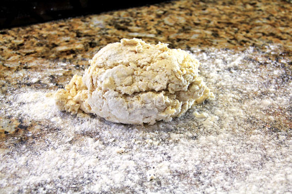 Flour your surface and plop the very cold dough in the center.