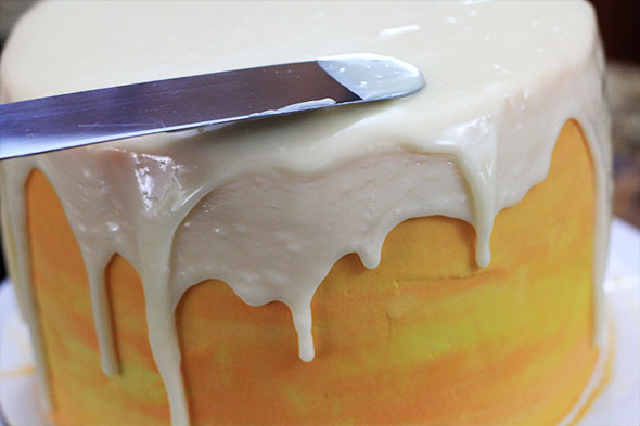 pour it on top of the cake and let it drip down the sides.
