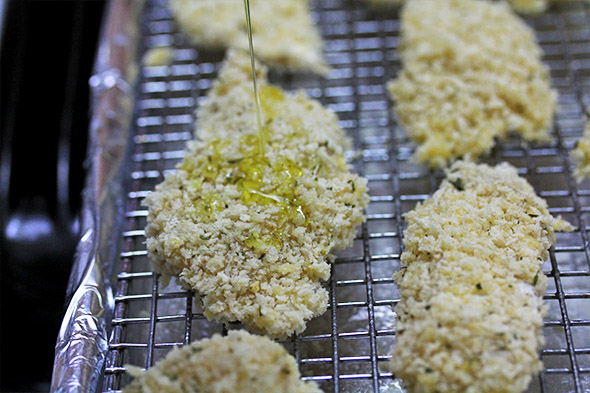 drizzle a tiny amount of olive oil onto each piece, this will just help give the outside some moisture, flavor, and added crunch. you could also just spray them with an olive oil or coconut oil spray. i didn't have any, so i drizzled. 