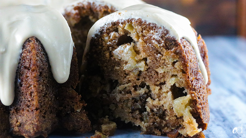 Spiced Apple Walnut Bundt Cake with Maple Cream Cheese Frosting