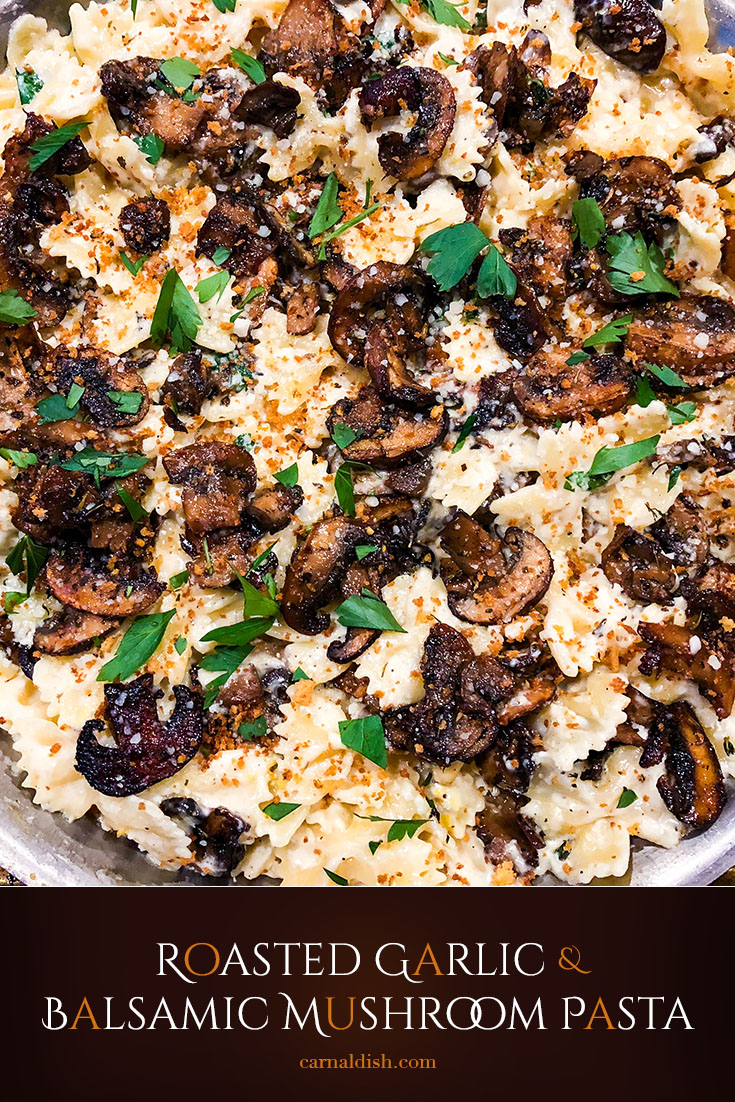 Creamy roasted garlic pasta alfredo tossed with bright lemon zest and balsamic roasted mushrooms, topped with crispy breadcrumbs. The perfect decadent meal for Meatless Monday | #carnaldish #meatlessmonday #meatless #roastedgarlic #roastedmushrooms #balsamicmushrooms #creamypasta #pasta #dinner #bowtiepasta #food #meals