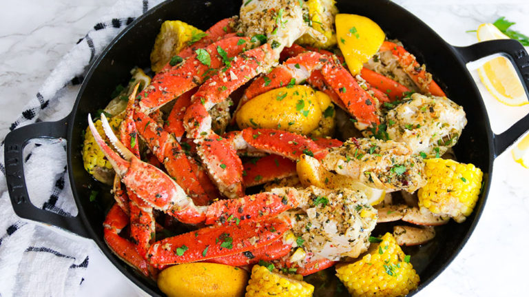 Boozy Garlic Butter Snow Crab Legs - CarnalDish